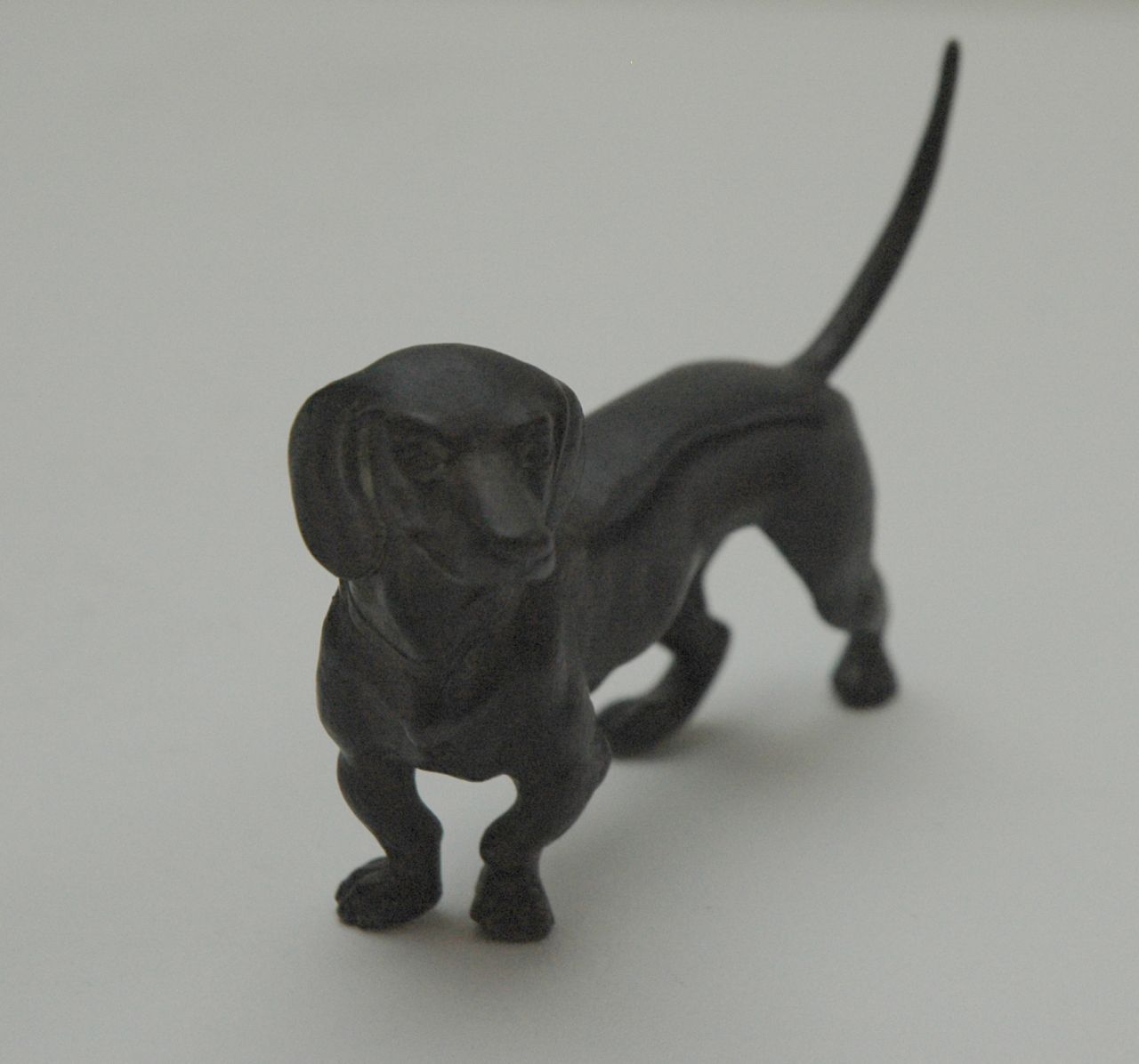 Duitse School   | Duitse School, Teckel, gepatineerd brons 5,5 x 9,0 cm
