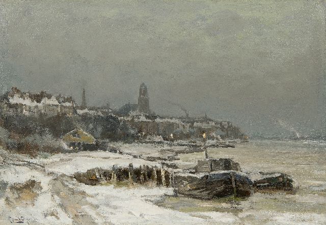 Louis Apol | Winters gezicht op Arnhem, olieverf op doek, 42,4 x 60,5 cm, gesigneerd l.o.